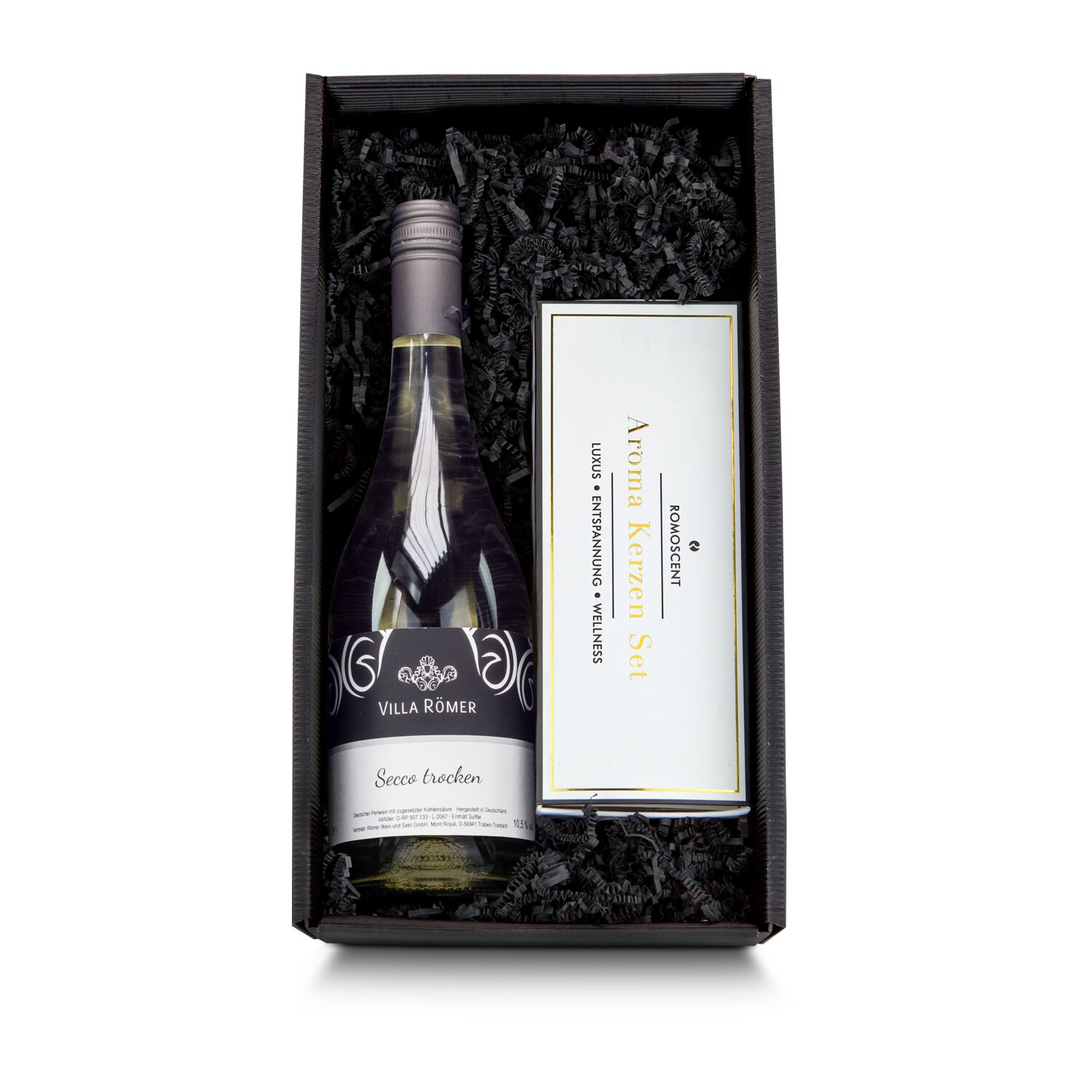 Eine Flasche hochwertiger Secco aus deutschem Anbau (0,75 l) und ein Aromakerzen-Set mit 3 Vanille-Kerzen.