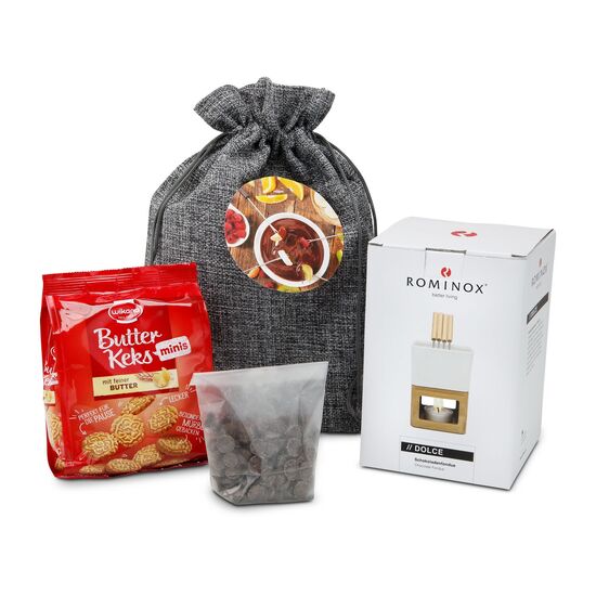 ROMINOX® Schokoladenfondue Dolce, dazu Schokodrops und leckere Mini-Butterkekse - verpackt im großen grauen Jutesack.